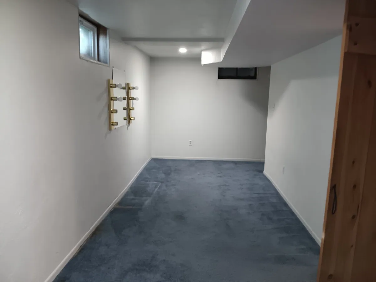 Lower level bedroom before renovation
