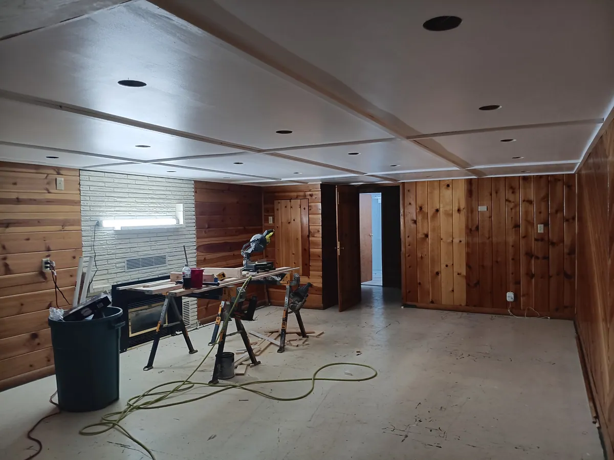 A basement mid-build with new soffits framed and boarded