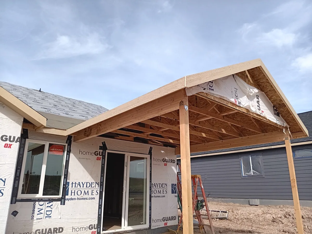 A covered patio roof we framed on a new production home